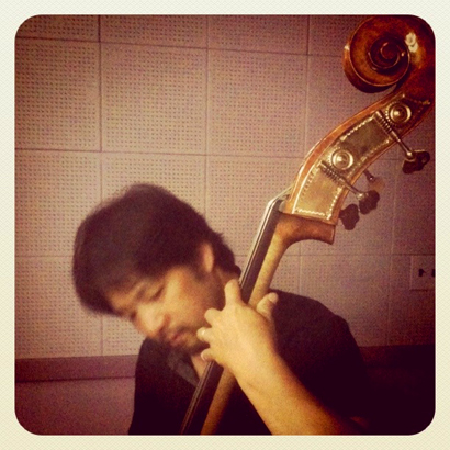 Eric playing upright bass at the Treasure Island 'Briefing Room' studio.